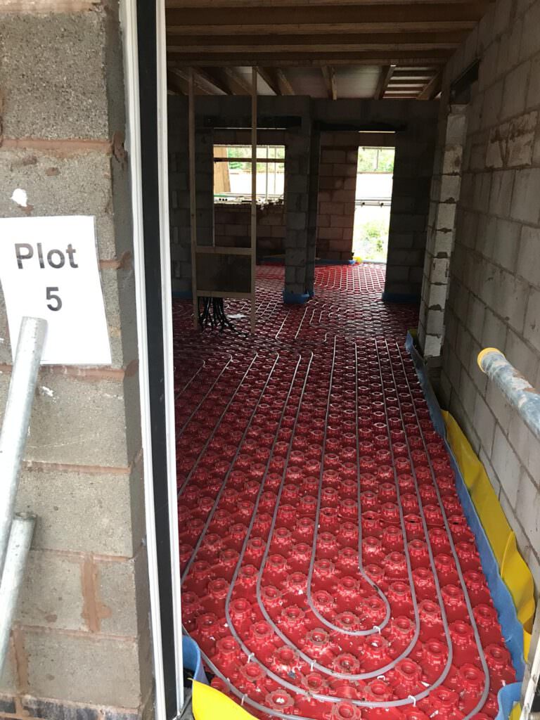 Underfloor heating pipes laid into Plot 5